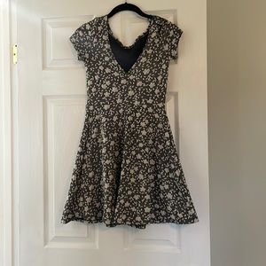 Small grey and white floral woman’s dress.